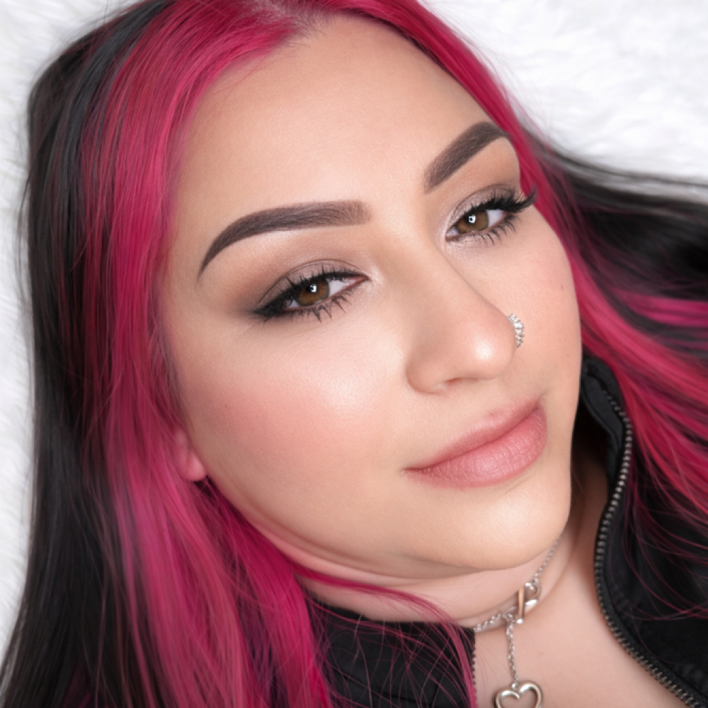 Client with soft, natural healed ombré powder brows